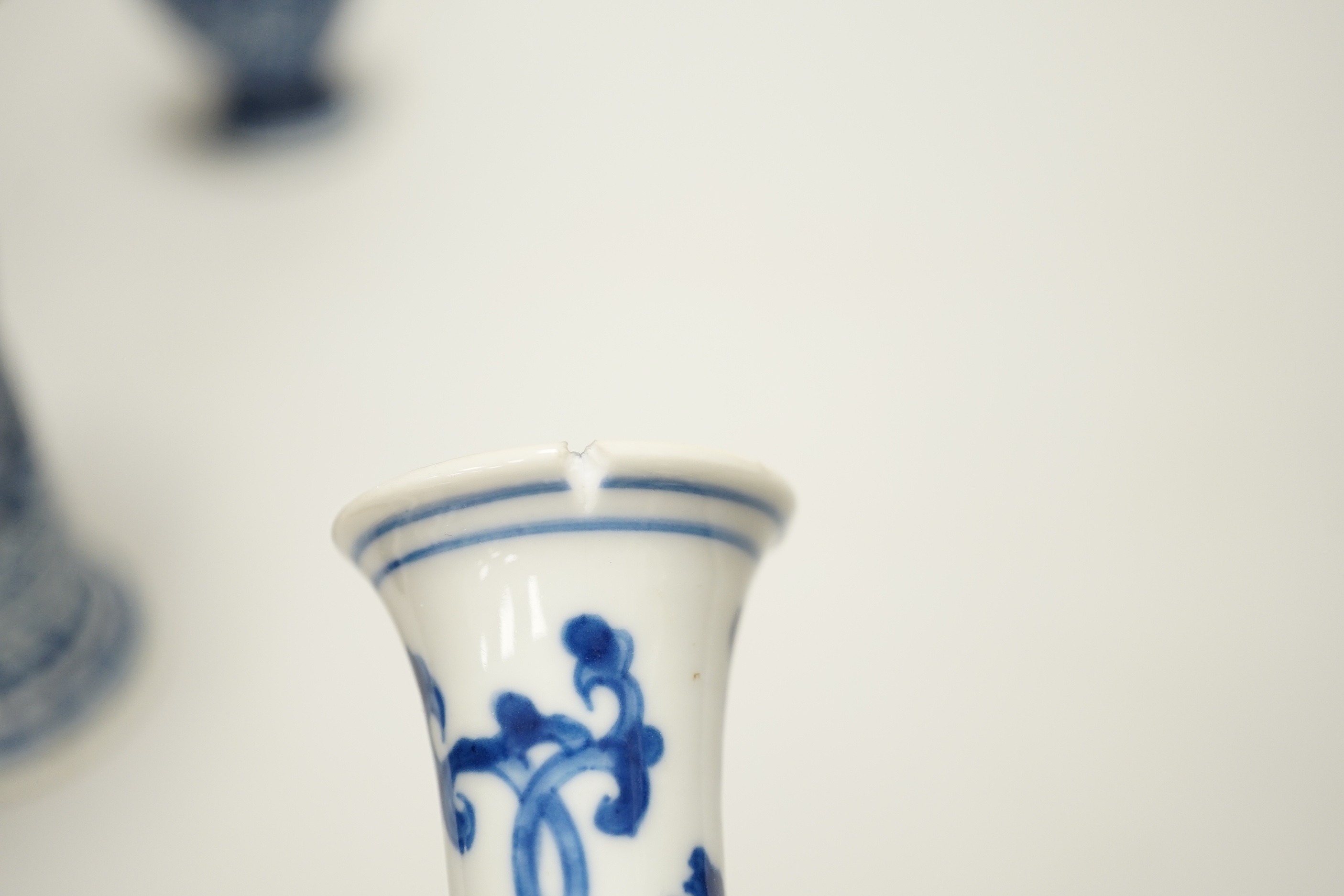 Four Chinese Kangxi period blue and white small vases, tallest 16cm high